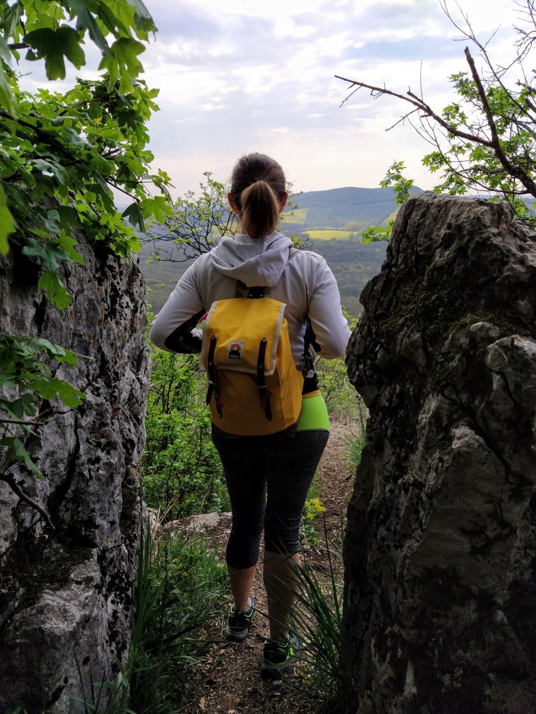 Standing between rocks 